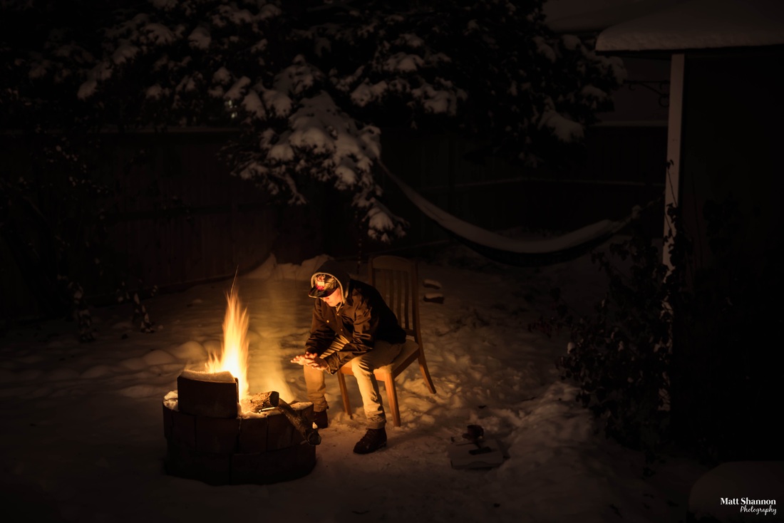 fire, bonfire, flames, camping, alberta, canada, camp, camping, snow, cold, winter, dark, alone, man, boy, person, warm, freezing, night, nightscape, night capture, jacket, warmth, yellow, bricks, hammock, tree, shed, ground, chair