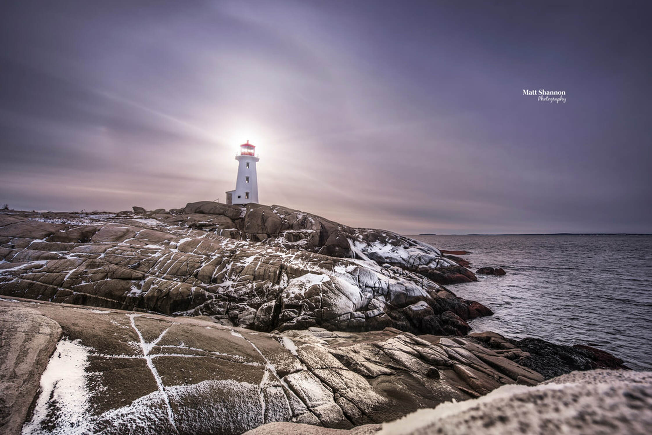 Picture, lighthouse, peggyscove, pegggy, cove, light house, snow, coast, water, ocean, sky, sunset, light beams, Nova Scotia, ns, Canada